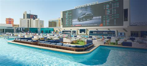 What hotel is stadium swim at, and how does it redefine the concept of luxury pool parties?